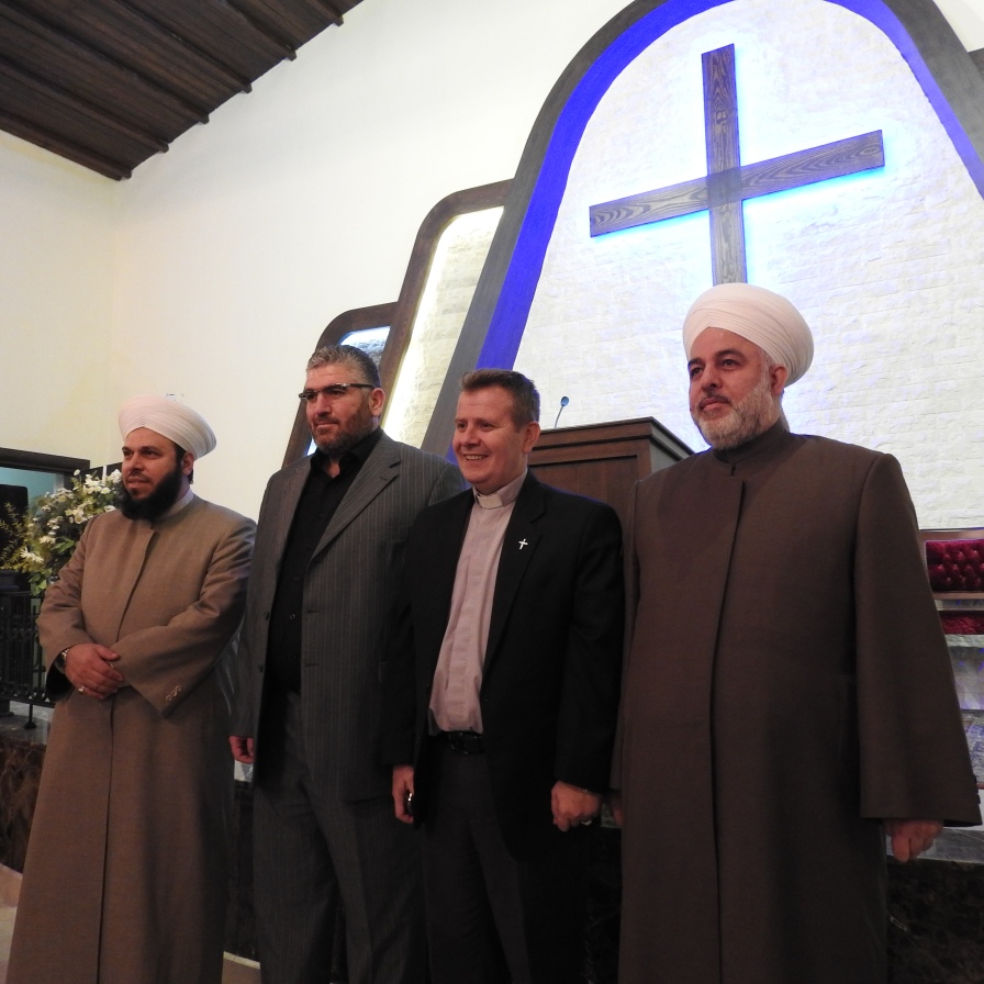 Rev. Ibrahim Nseir, pastor of the Arab Evangelical Presbyterian Church of Aleppo, with three top Sunni scholars and leaders, Dr. Rami Obeid, Rabih Kukeh, Sheikh Ahmed Ghazeli, who reject Wahhabism. Dr. Kukeh said of the terrorist factions: “Those who are killing the Sunnis are the same who claim that they are defending the Sunnis.” Nov. 2, 2016. https://www.mintpressnews.com/aleppo-how-us-saudi-backed-rebels-target-every-syrian/222594/